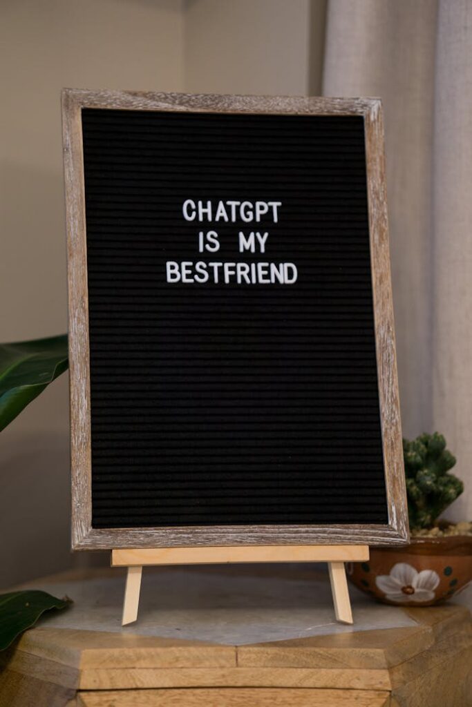 A wooden framed sign displaying the text 'ChatGPT is my bestfriend' on a black background.